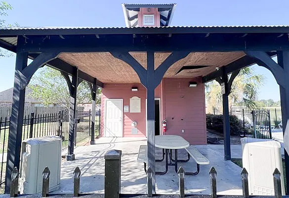 Common pool sitting area with restrooms