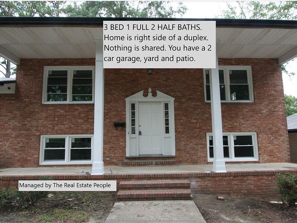 FRONT OF HOME. - 2 CAR GARAGE IS ON RIGHT SIDE OF HOME. THIS IS THE RIGHT SIDE OF A DUPLEX. EVERYTHING IS BRAND NEW