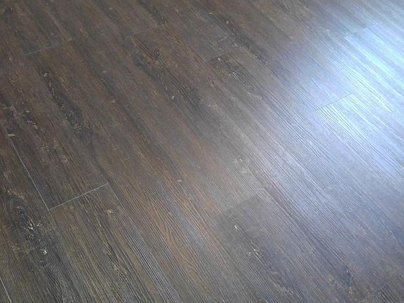 Durable luxury vinyl tile throughout the entire home