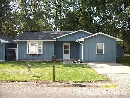 Exterior: front view
						:
						several mature trees on the property