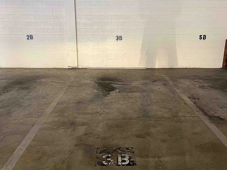 This is one of the most acessible spaces in our garage - easy in and one 3 point backout. No tight turns!!