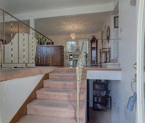 Front entry landing and a few steps to the upper level. 