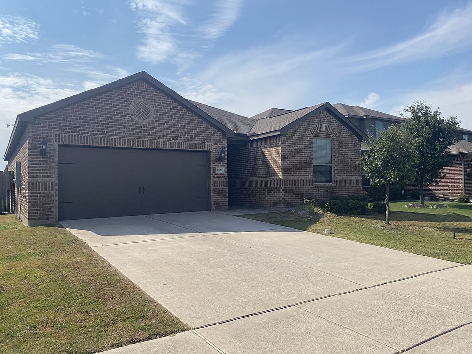 Front with view of front entry garage
