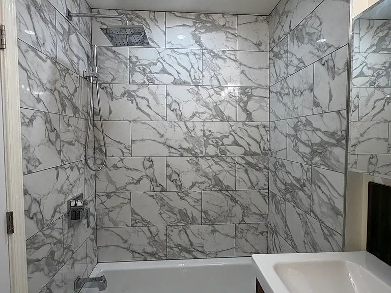 Guest Bathroom - Cast Iron Kohler bathtub and shower