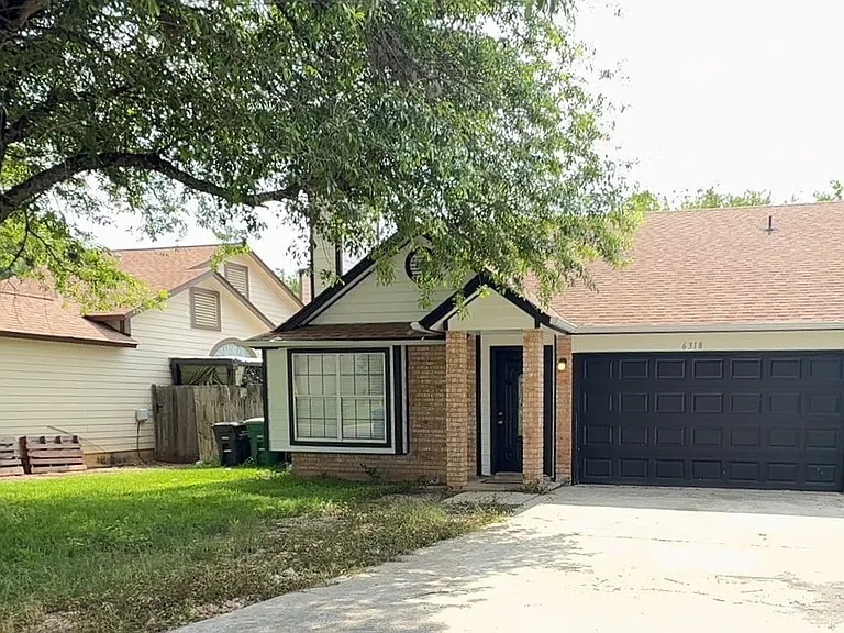 6318 Les Harrison Dr — Photo 1