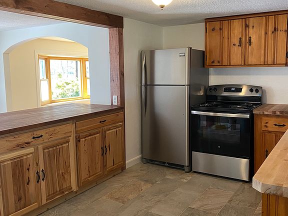 Kitchen with island into Dining room