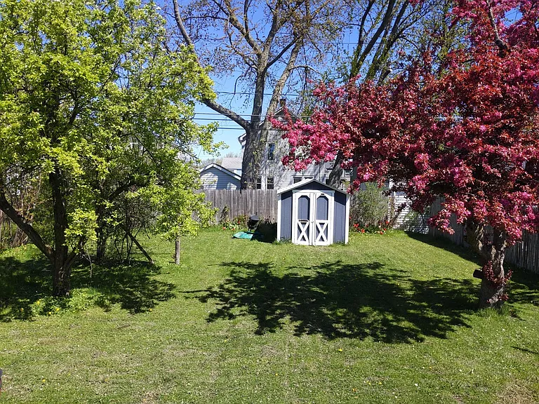 Very nice treed yard, fenced on both sides and back, storage shed, tenant is responsible to mow the lawn and shovel the snow, rake leaves.