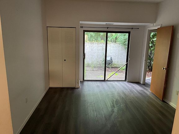 Sliding door from bedroom to private courtyard.