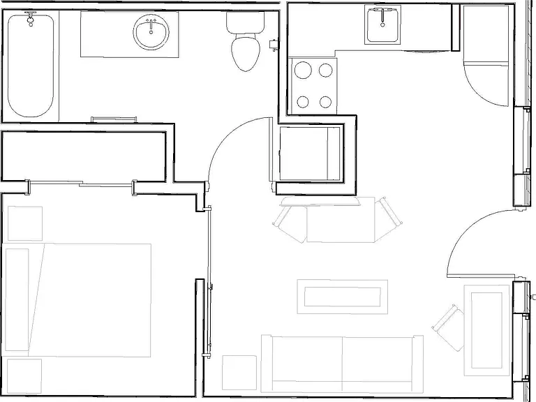 First floor studio apartment featuring private bedroom with barn door. First floor studio apartment featuring private bedroom with barn door.