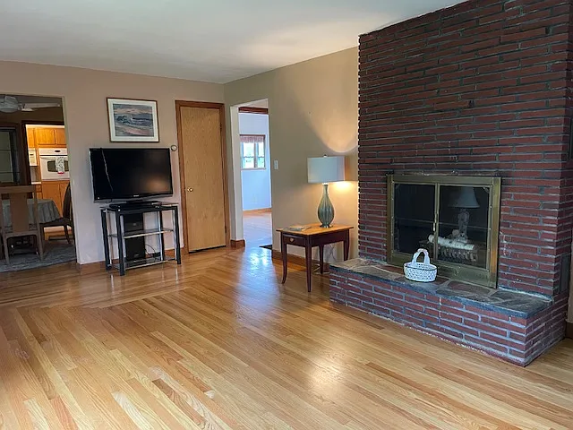 family room with large bay window with lots of sun
