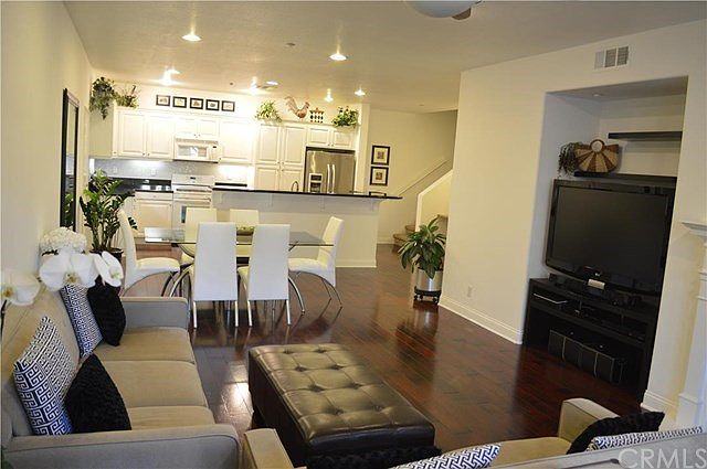 Living Room looking into dining and kitchen