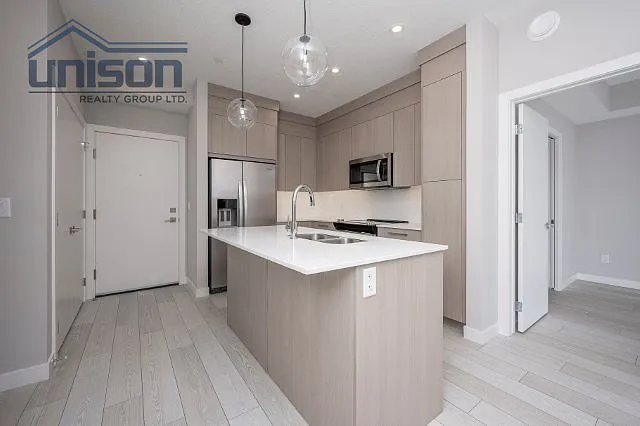 265 Wolf Willow Blvd SE #2115 — Photo 32