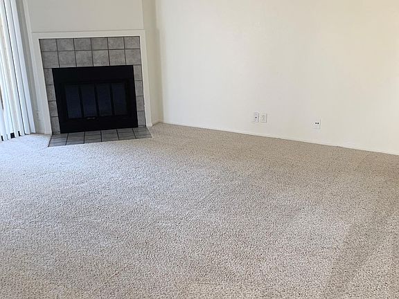 Living Room with Wood Burning Fireplace