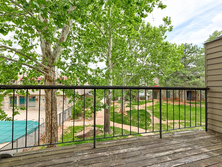 Balcony patio with storage room.