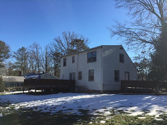 large rear fenced yard and 2 decks