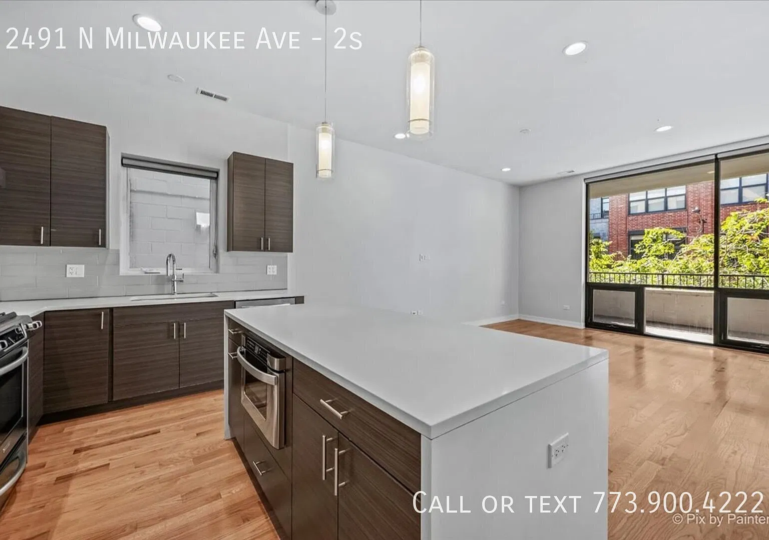 Spacious 3 Bed, 2 Bath Logan Square Condo | Private Rooftop Deck, Elevator & Garage Parking Included — Photo 2