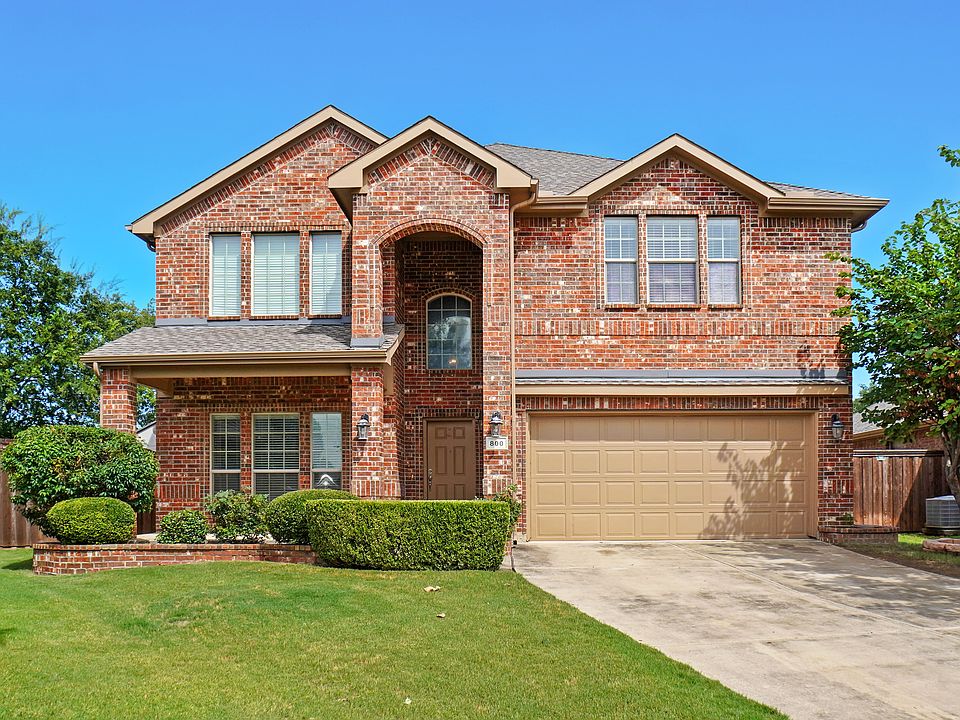 Great Curb appeal on two story, brick home with 2 car garage.