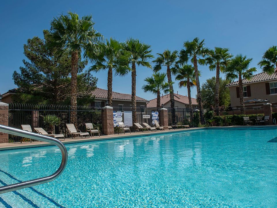 Pool with condo in the background