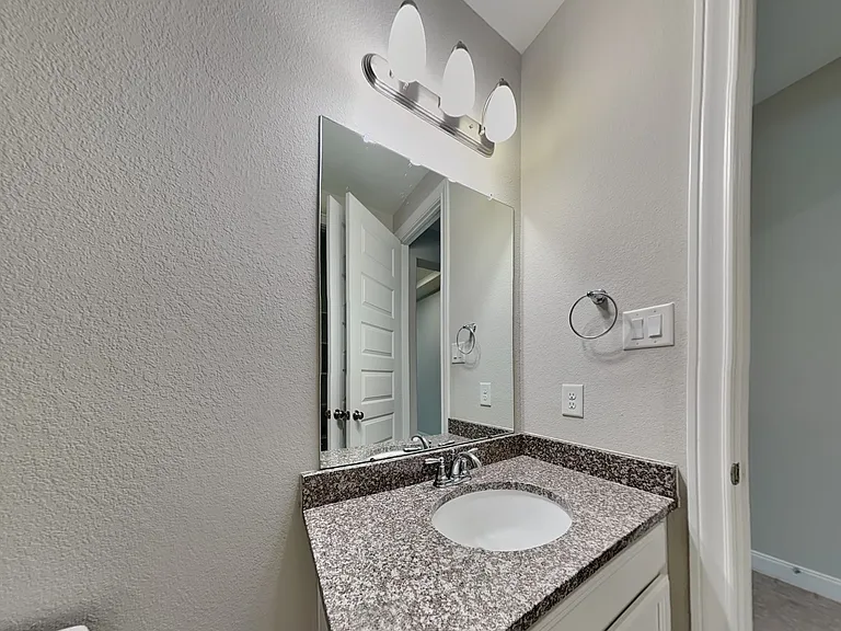 This bathroom features a sleek