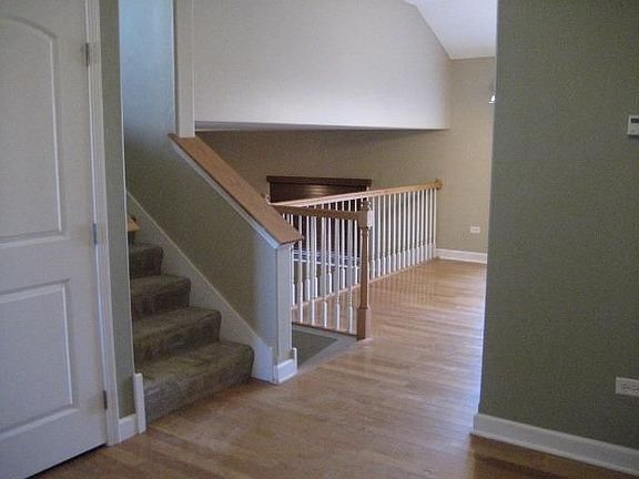 Living Room looking at stairs to Upstairs Bedrooms and Downs