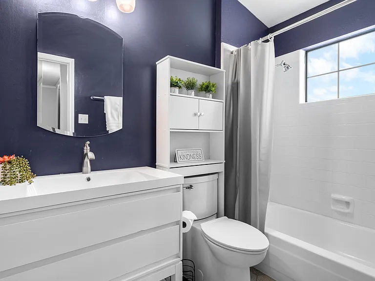 The hall bath has been updated as well.