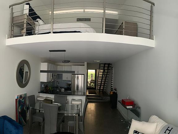 Living room / dining / kitchen & bedroom view