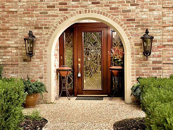 Entry with leaded glass doors.