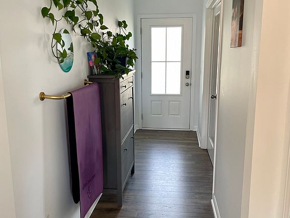 Looking at front door down the foyer