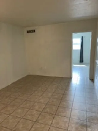 Building Photo - 1230 W 54th St #316A