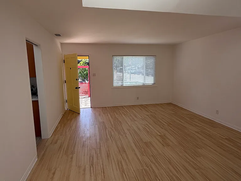the very bright living room 14' 4" x 18'
