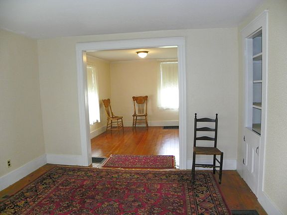 living room opens to dining room