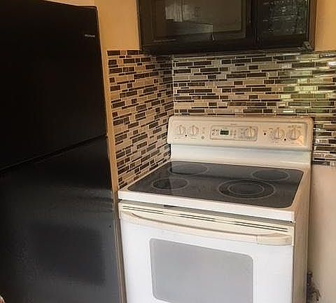 Kitchen with microwave
