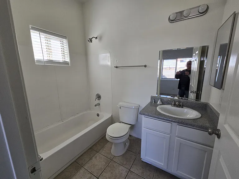 Clean Full Bathroom with Tub