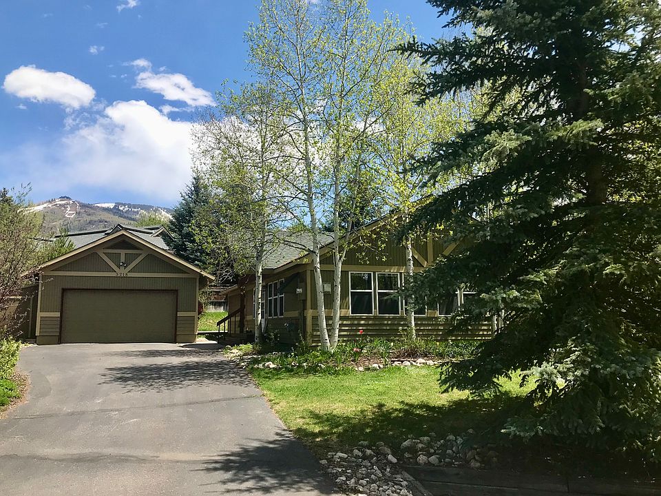 Driveway & garage- house to right. Looking towards the ski area.