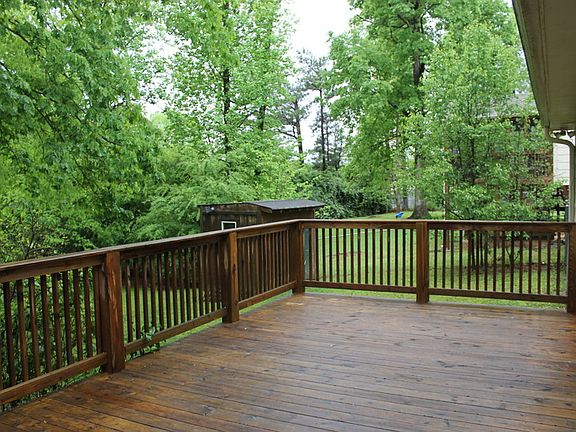 Deck
						:
						Brand new deck overlooking back yard and storage shed.
