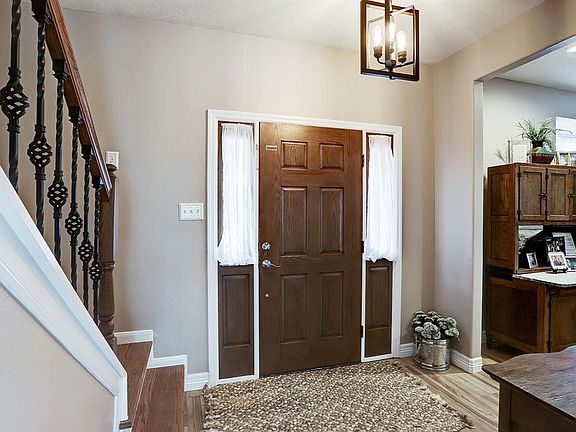 The foyer is open to the Formal Living/Dining Room combo. The area has one of the lowest tax rates in Cinco Ranch and has never flooded.