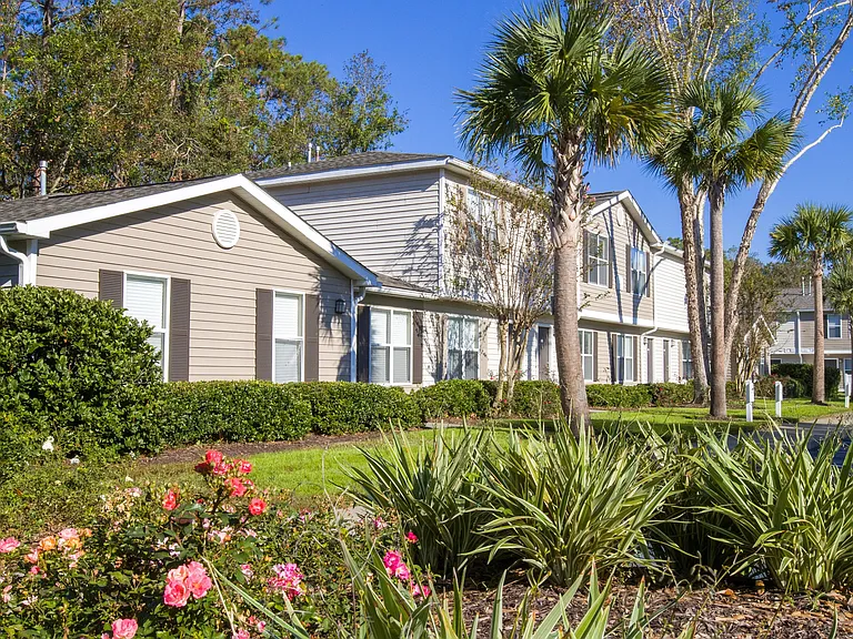 Lush landscaping and freshly painted buildings welcome you to a pristine haven.