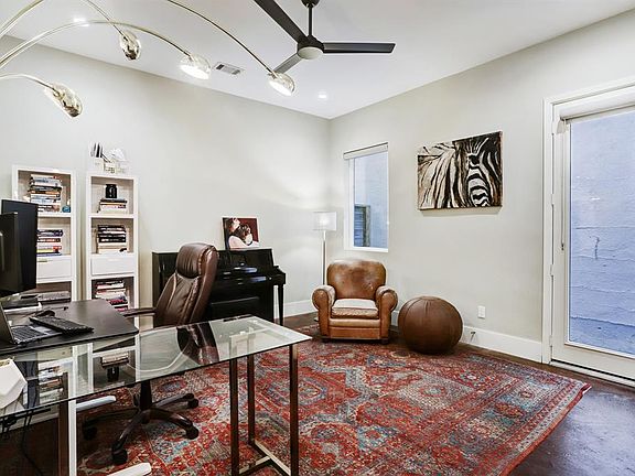 First floor spacious secondary bedroom currently used as an office but a perfect solution for a guest bedroom. Beautiful easy maintenance concrete floors.