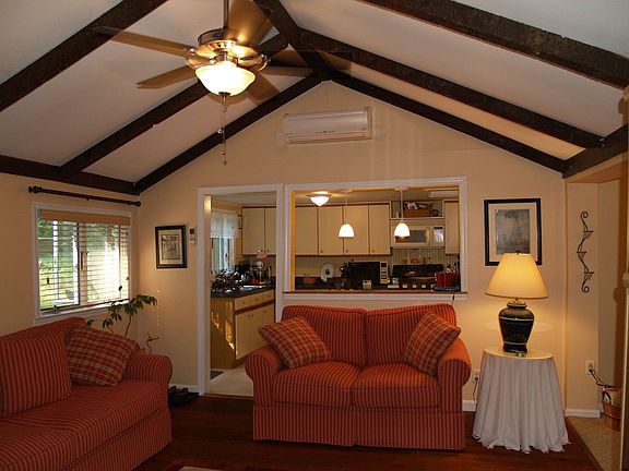 Living rm with vaulted beam ceiling