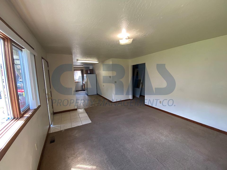 Roomy living space with lots of light. dining area with room for a cafe table and chairs.