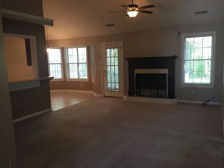 Photos are older due to current tenant. New carpet and fresher paint. Fireplace in the living room!
