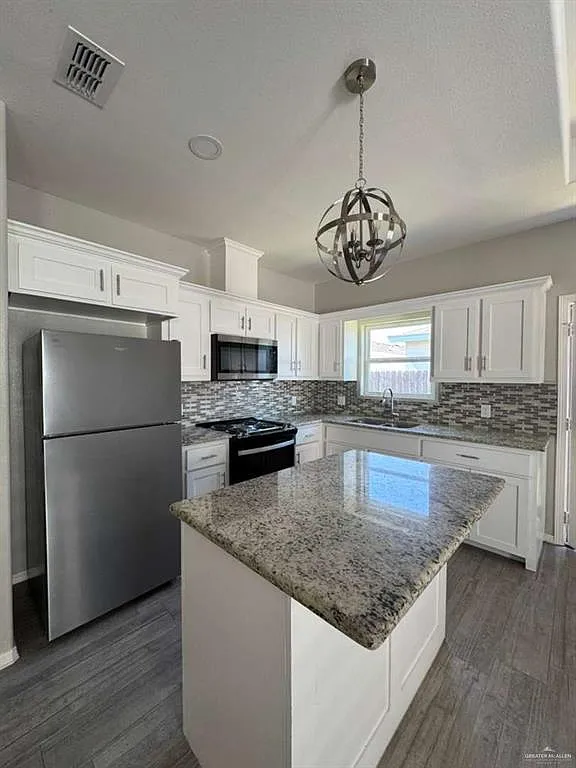 Building Photo - 5007 N Winona Dr #3