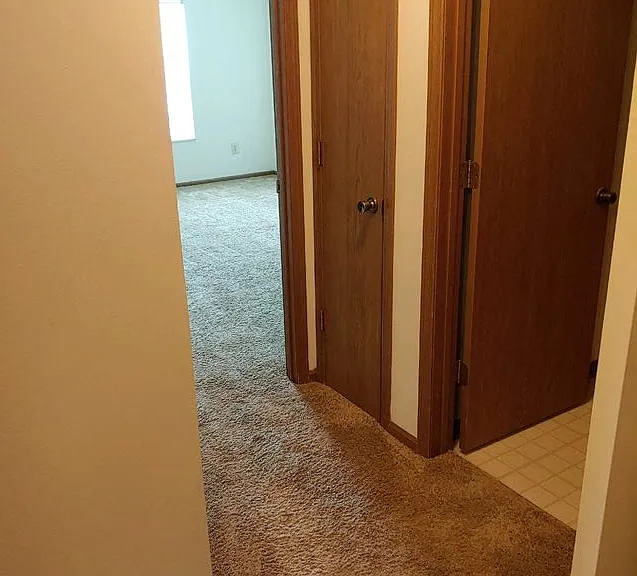 Apartments Labeled Standard Feature Oak Trim and Vinyl Flooring