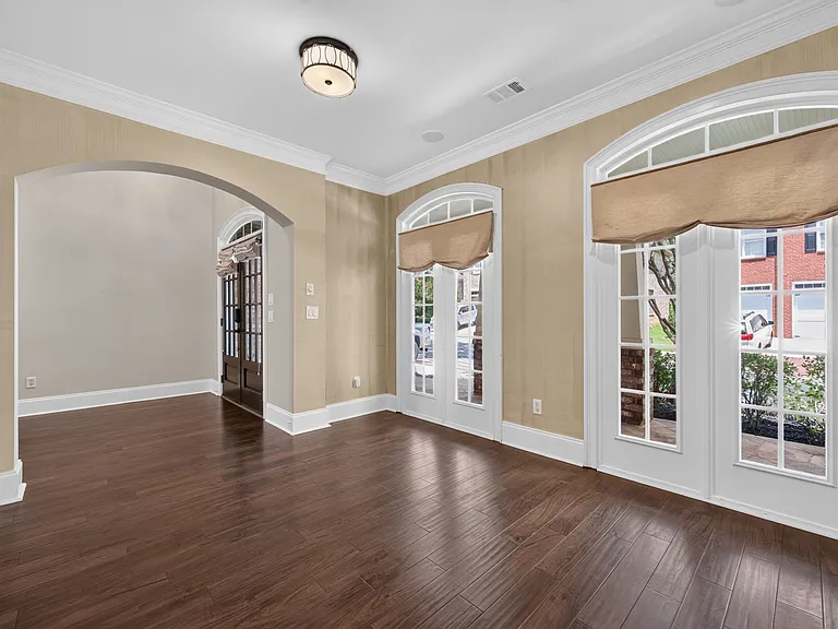 Study or formal living room off of the front door with tons of light
