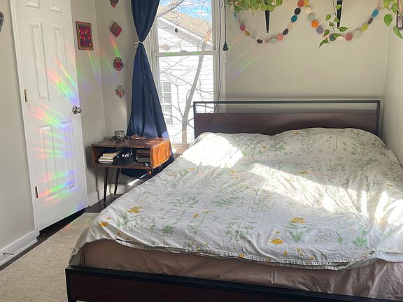 Great natural sunlight in main bedroom, also equipped with split duct HVAC unit.