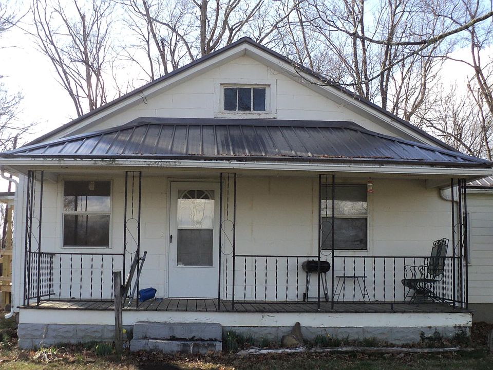 3526 Oakview Drive, front of house with updated metal roof and covered front porch