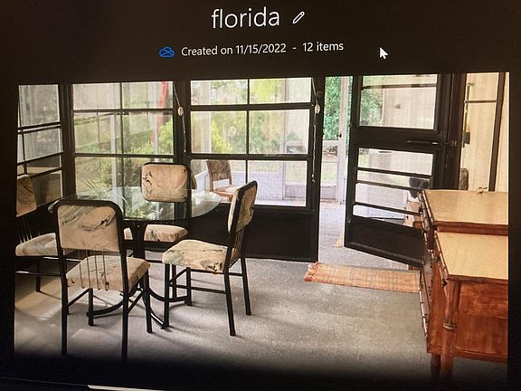 This enclosed lanai has three entrances, one from the birdcage pool, one from the attached additional seating area and laundry, and to the livingroom by slider. Two great outside locations to sit enjoy the peace and quite while enjoying your morning coffe