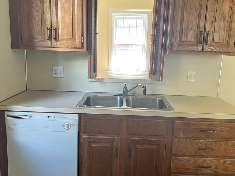 Kitchen with pass through and dishwasher