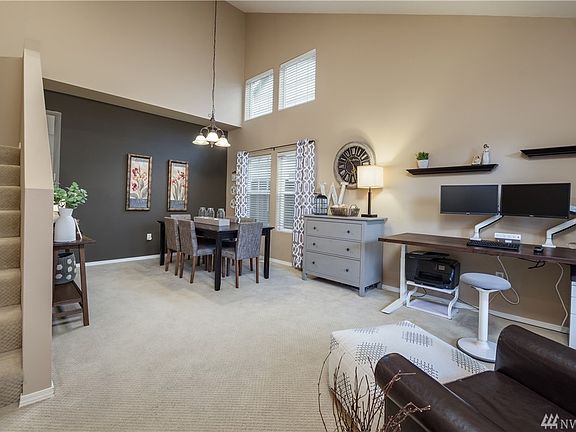 Vaulted ceilings in the formal living and dining rooms