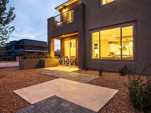The front yard of the Ocotillo enhanced with custom landscaping and plenty of space for outdoor enjo